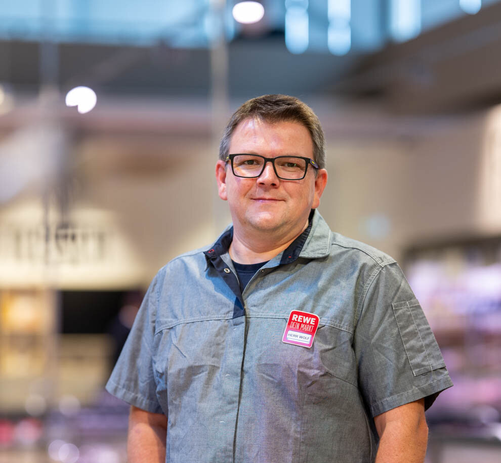 Porträt REWE-Kaufmann Michael Wolf